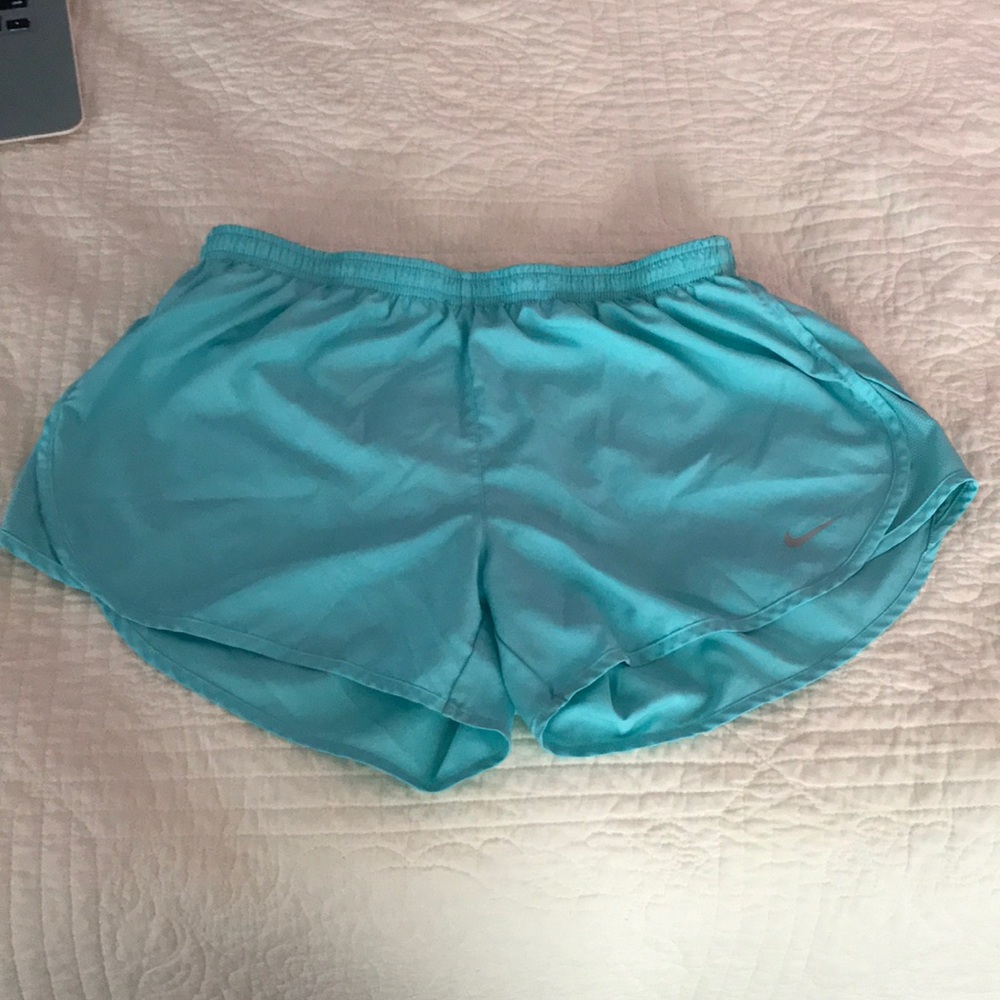 Teal Nike running shorts